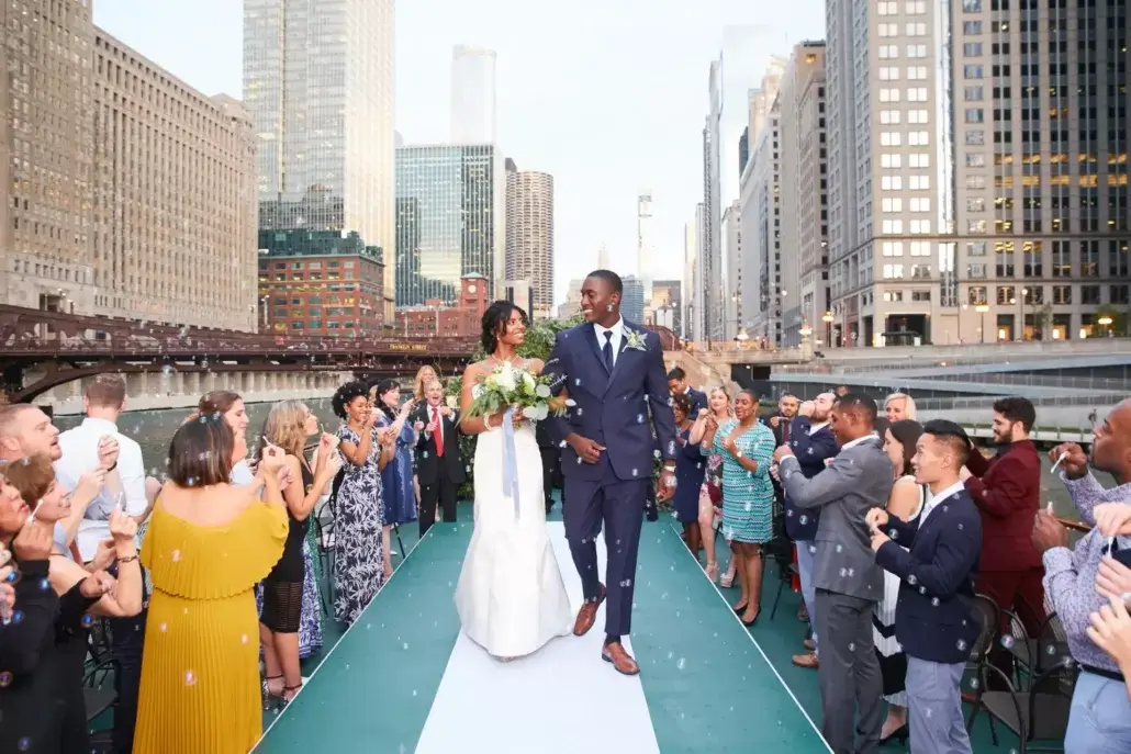couple walking down the aisle on Chicago’s First Lady boat